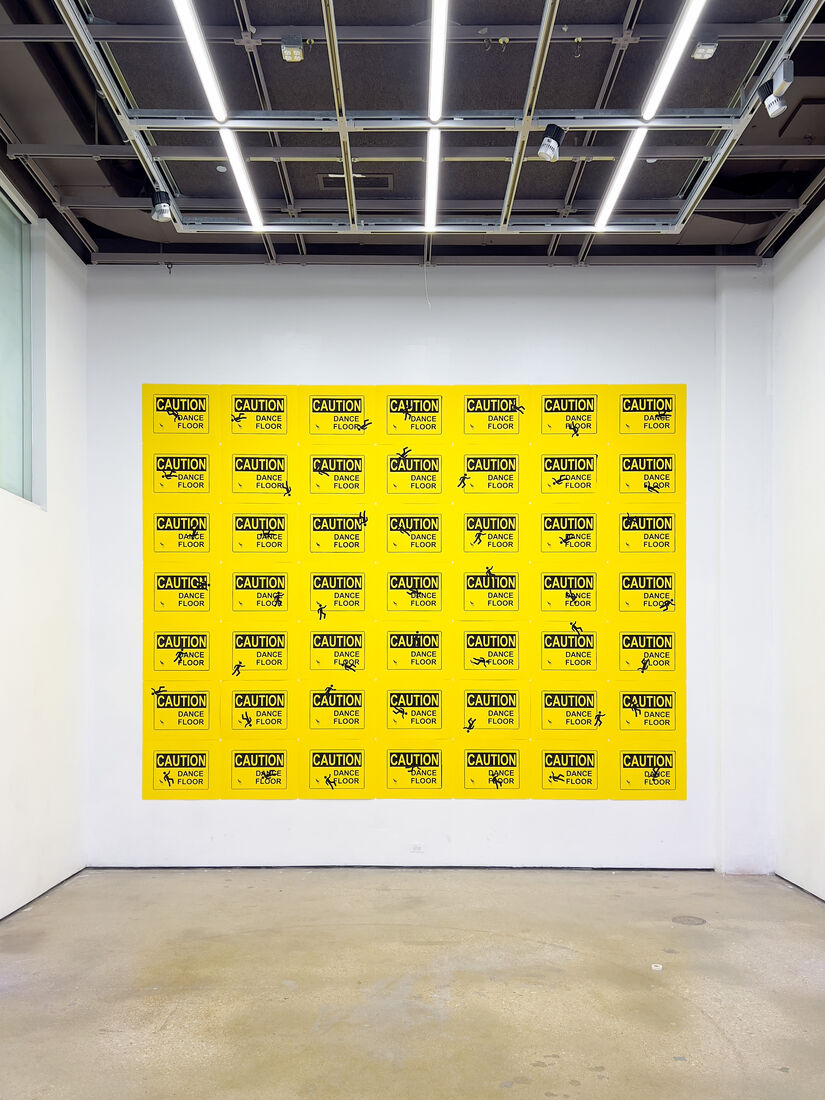 CAUTION! Dance Floor, a grid of silkscreen prints of caution signs