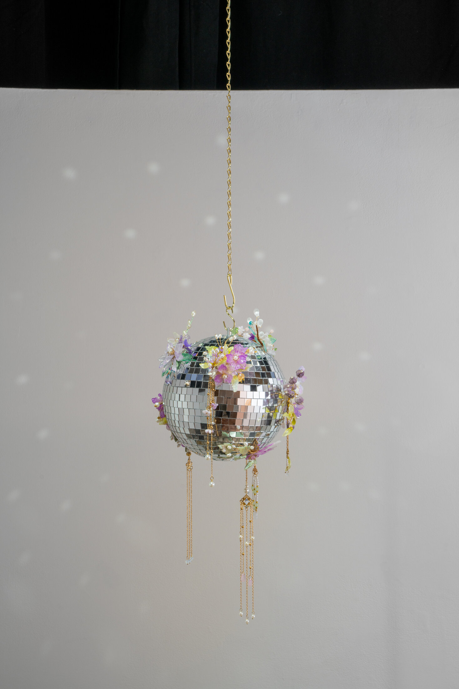 Flower in the Mirror Moon on the Water 镜花水月 #7, Grain in Beard 芒种, a mirror ball adorned with plastic floral beadwork