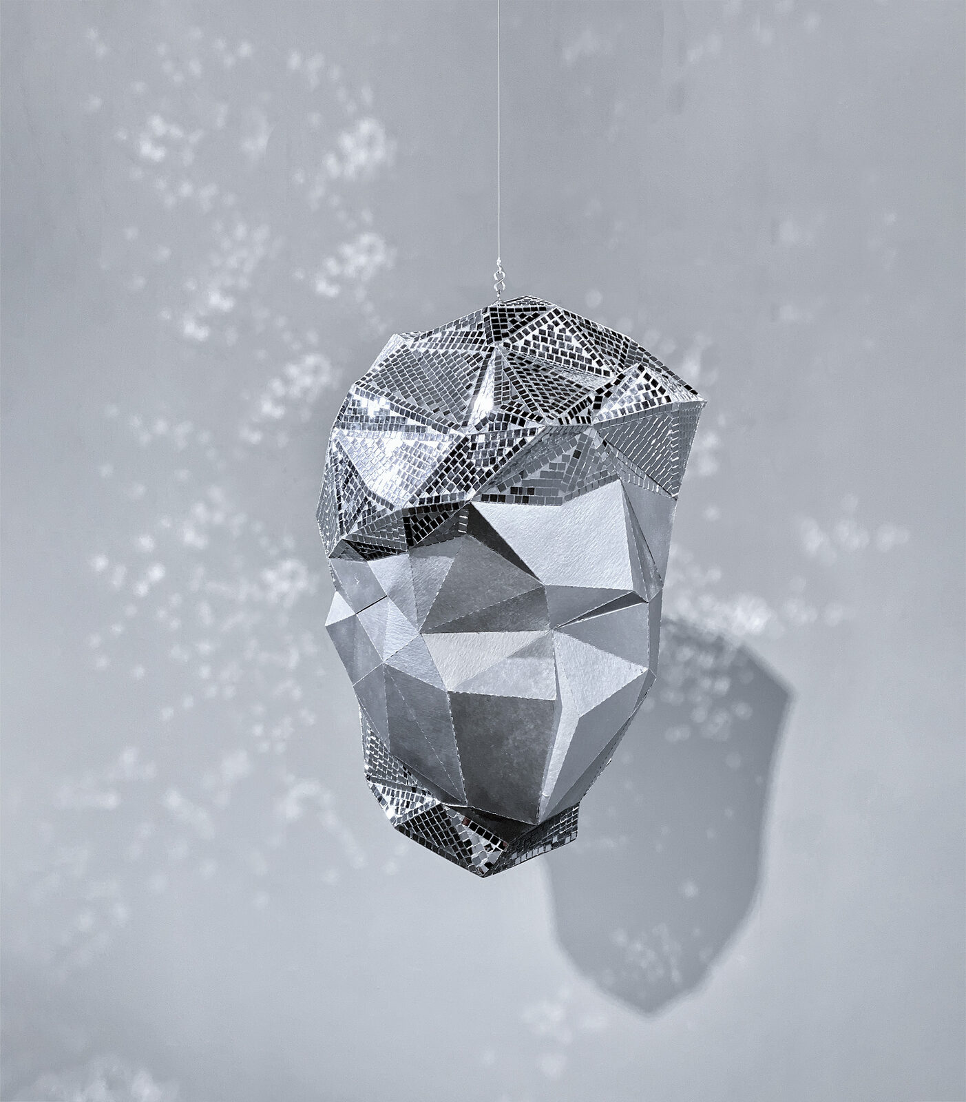 Self-Portrait Radiant, a disco ball cast from a digital scan of the artist's head